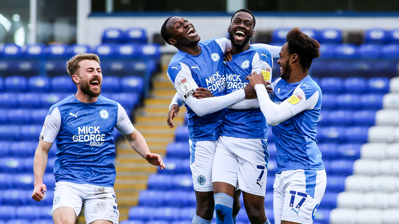 27th March '21 | A jubilant Mo Eisa and team-mates celebrate during the 7-0 rout of Accrington Stanley