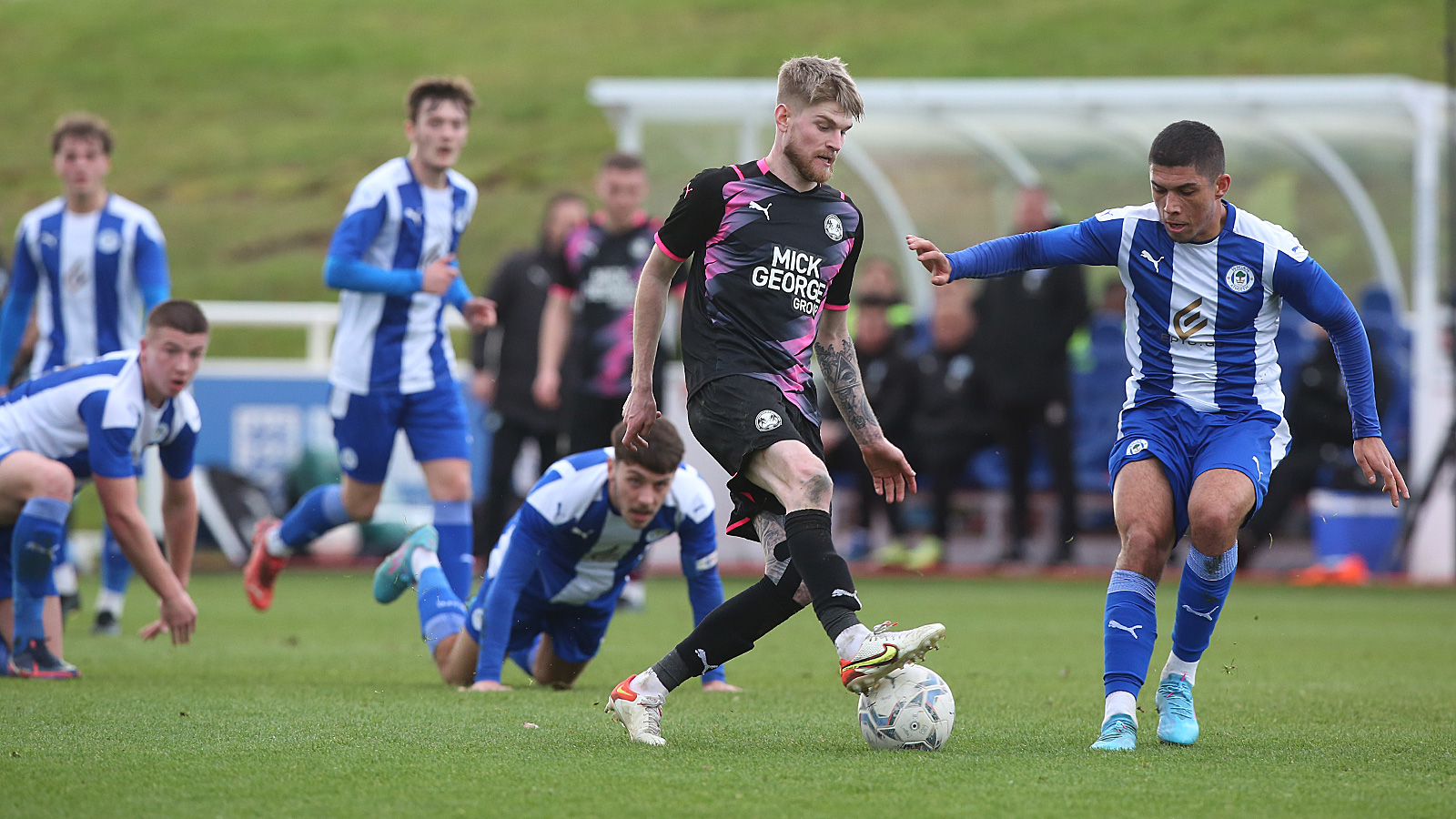 Hayden Coulson in action against Wigan Athletic