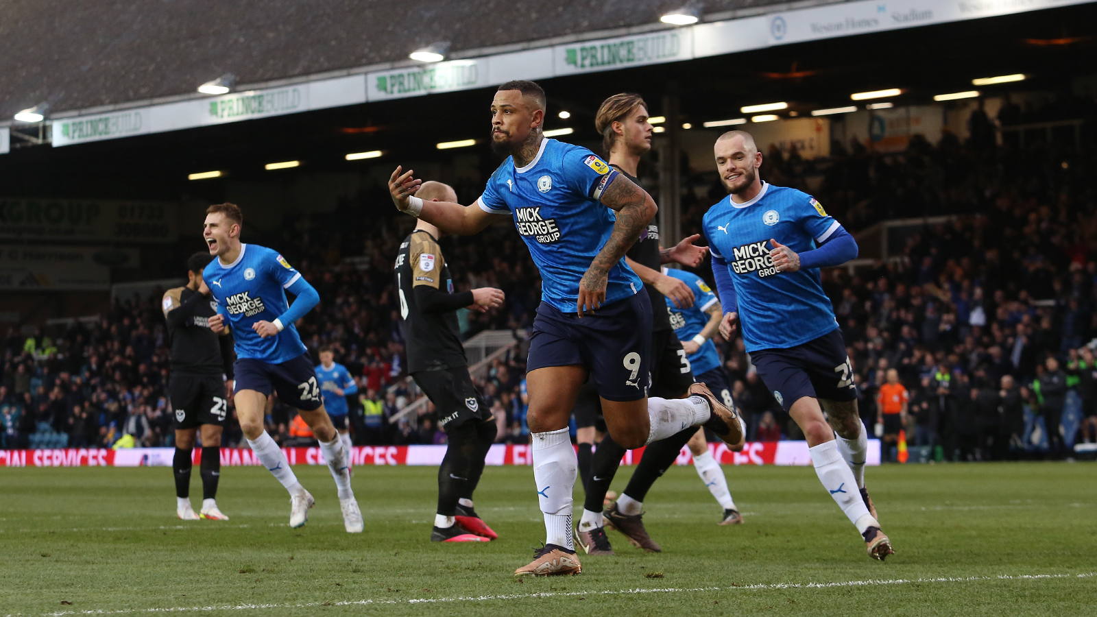 Jonson Clarke-Harris celebrates against Portsmouth
