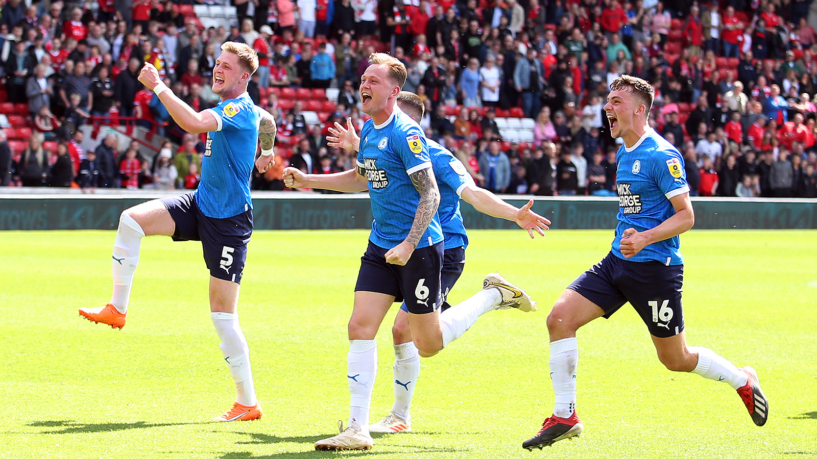 The players celebrate the win at Barnsley