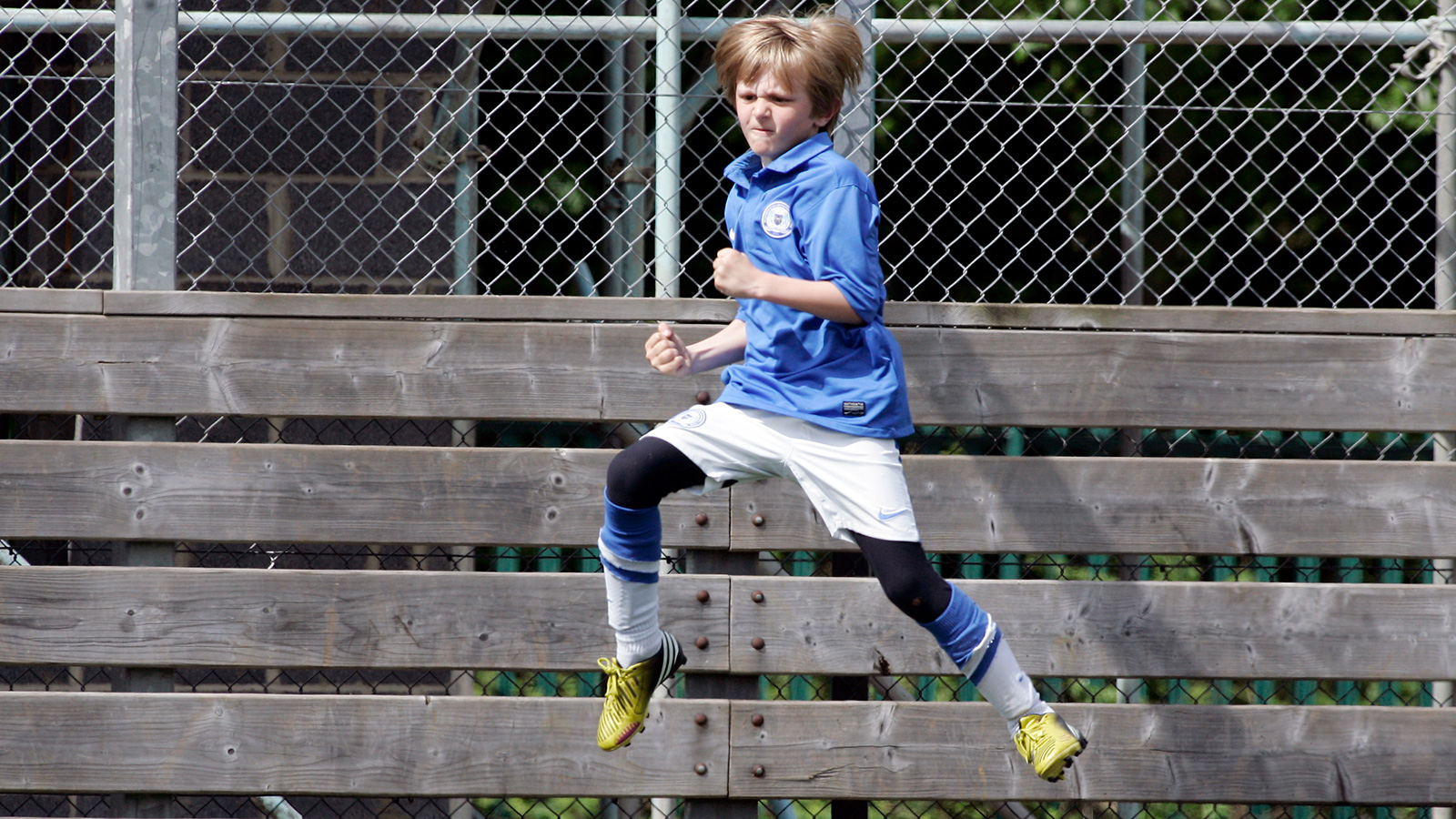 A young Will Van Lier celebrates scoring for Posh U10s