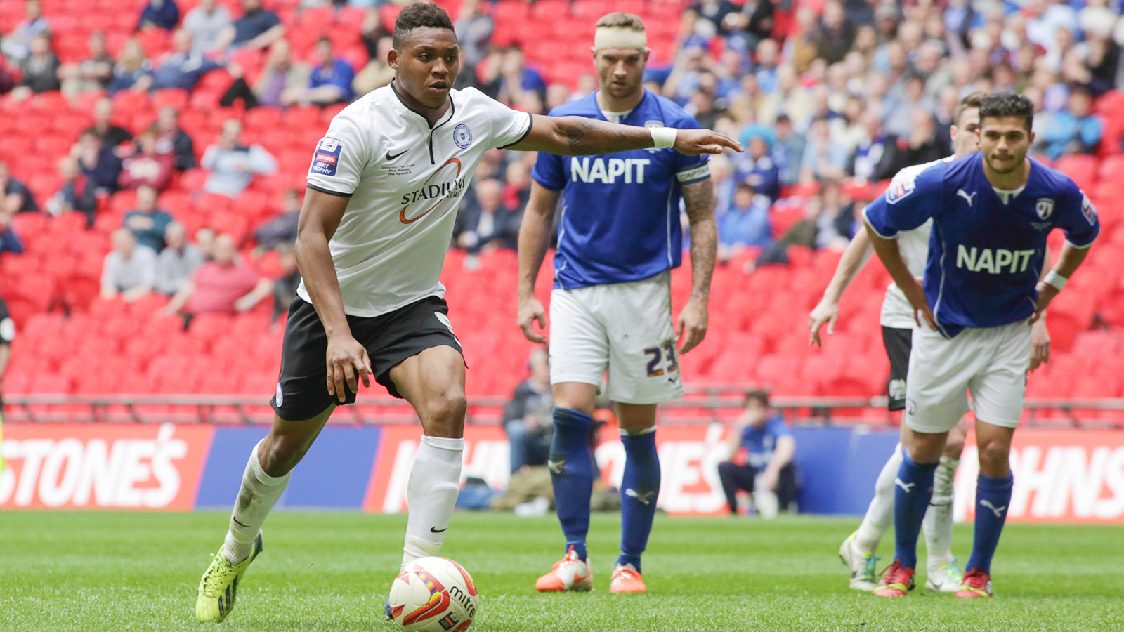 Britt Assombalonga scores from the penalty spot at Wembley