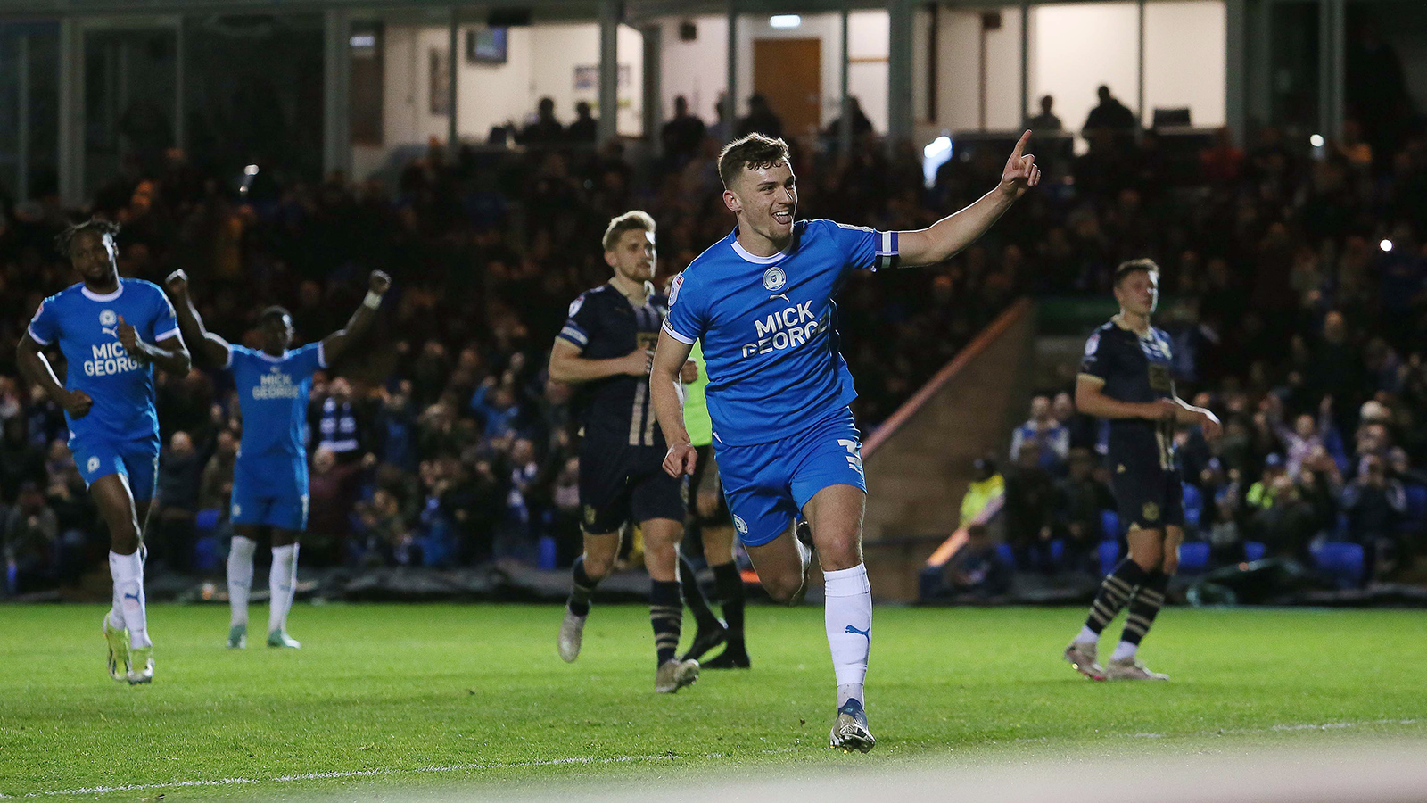 Harrison Burrows celebrates scoring his goal against Port Vale