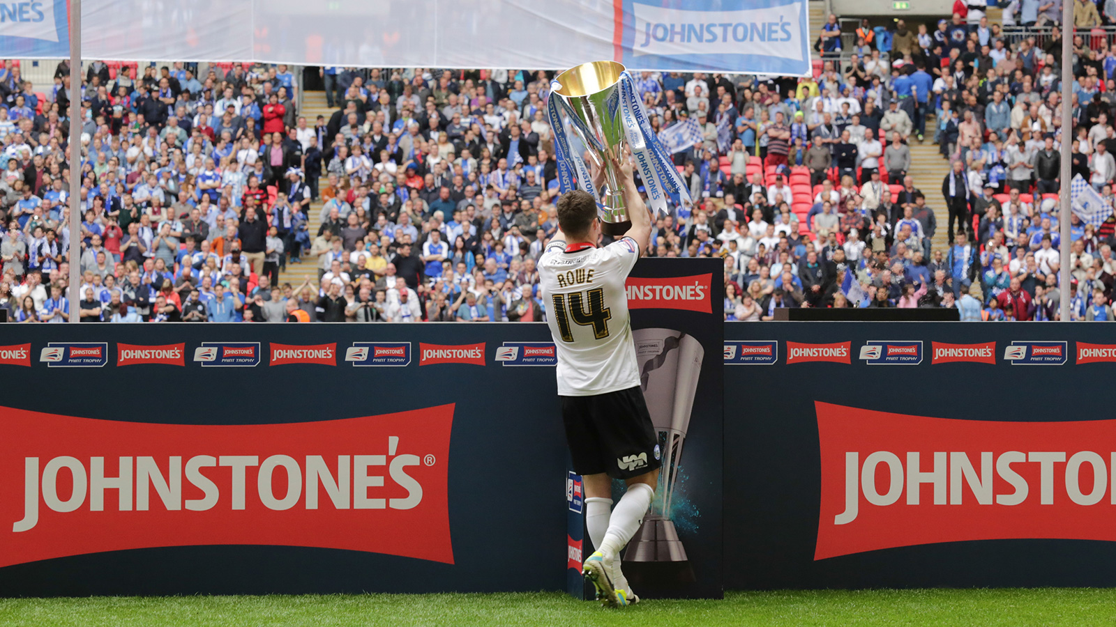 Tommy Rowe with the Johnstone's Paint Trophy