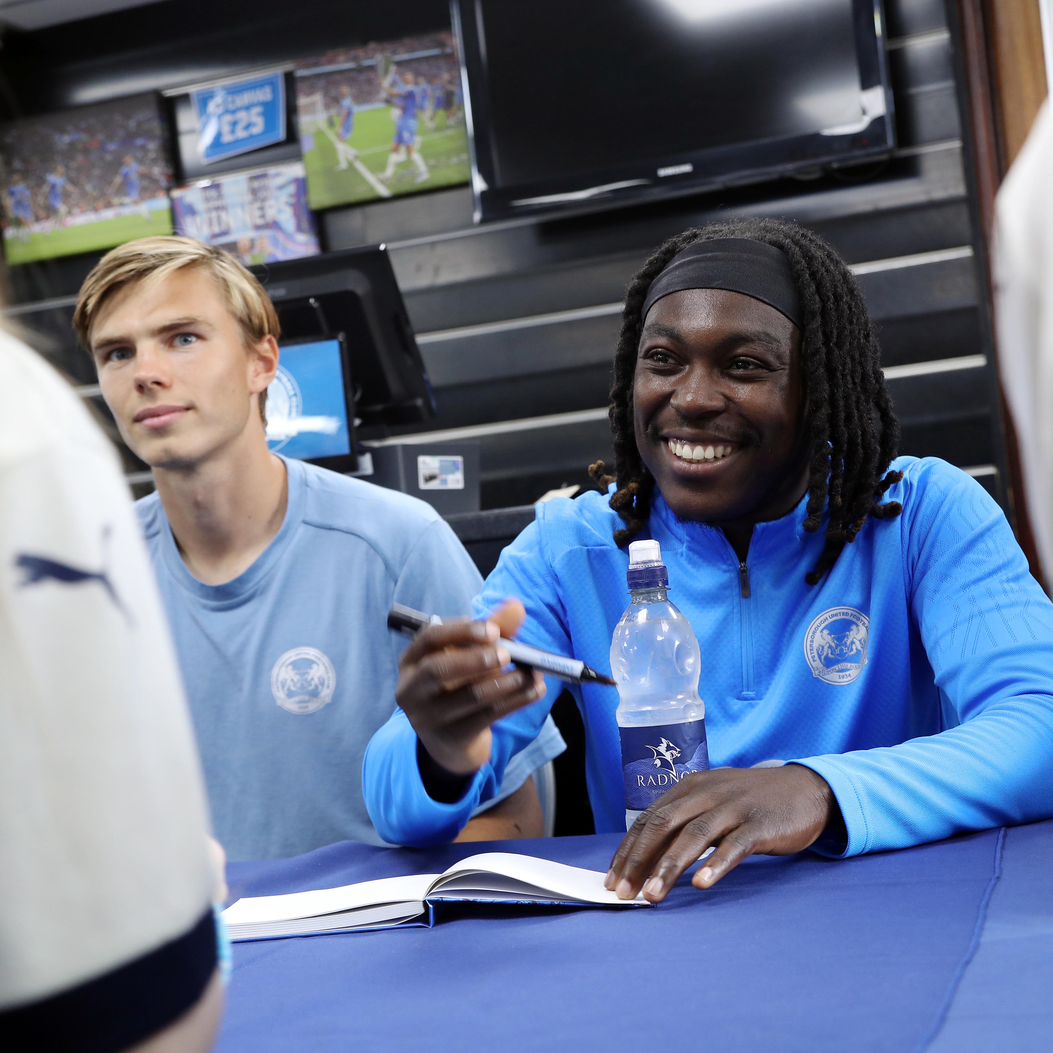 Abraham Odoh is all smiles during the Signing Session