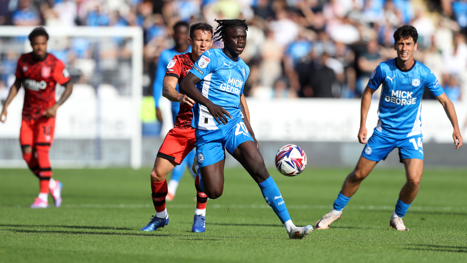 Action between Posh and Huddersfield Town