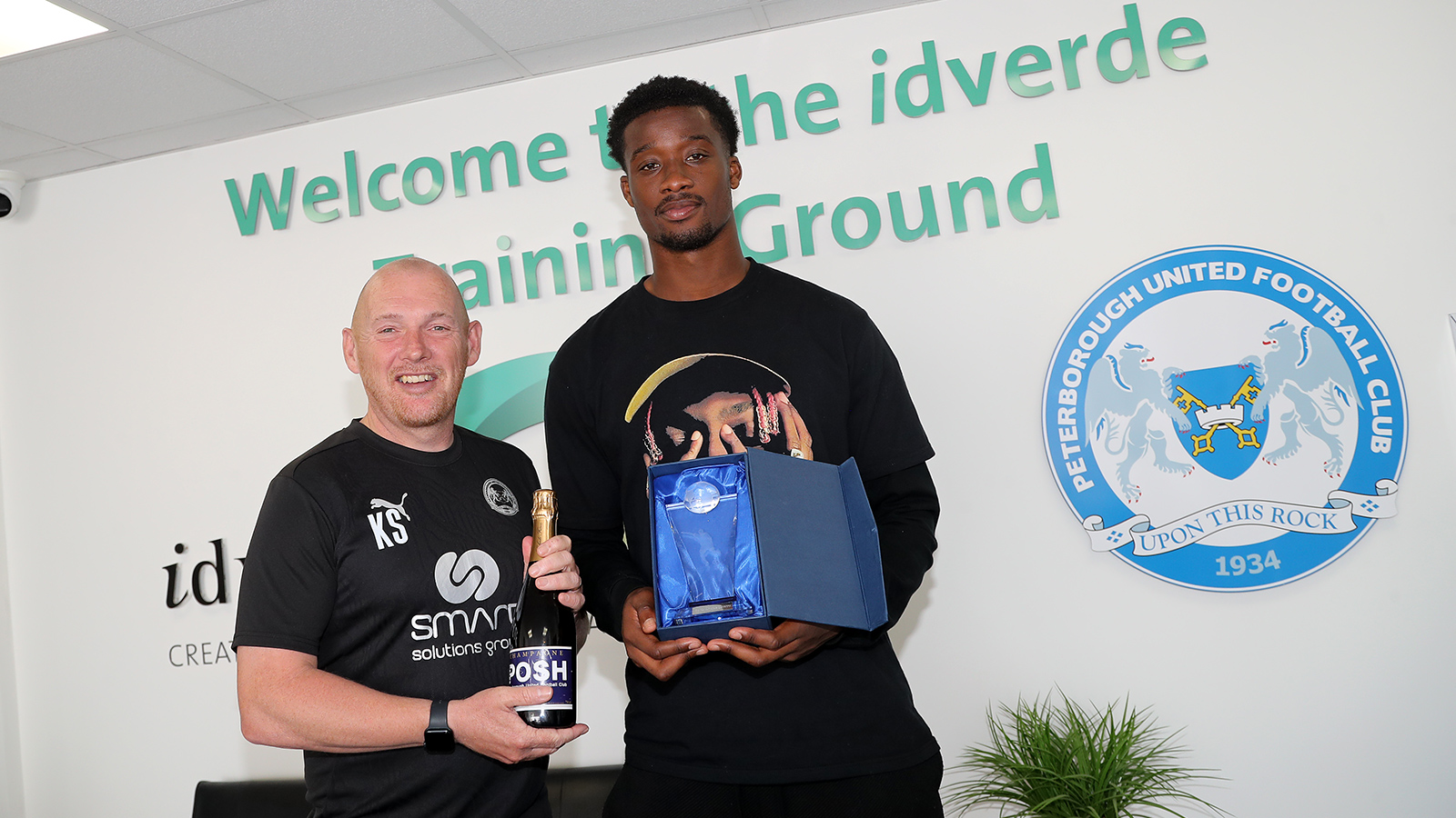 Emmanuel Fernandez is presented with the Goal of the Month award