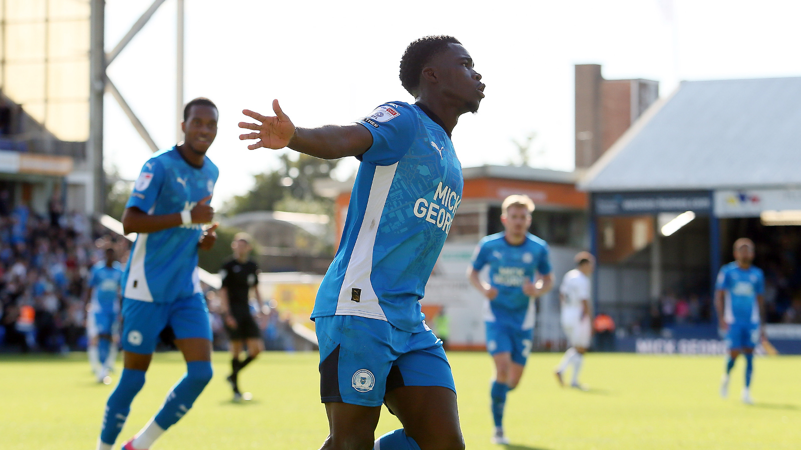 Kwame Poku celebrates scoring against Lincoln City