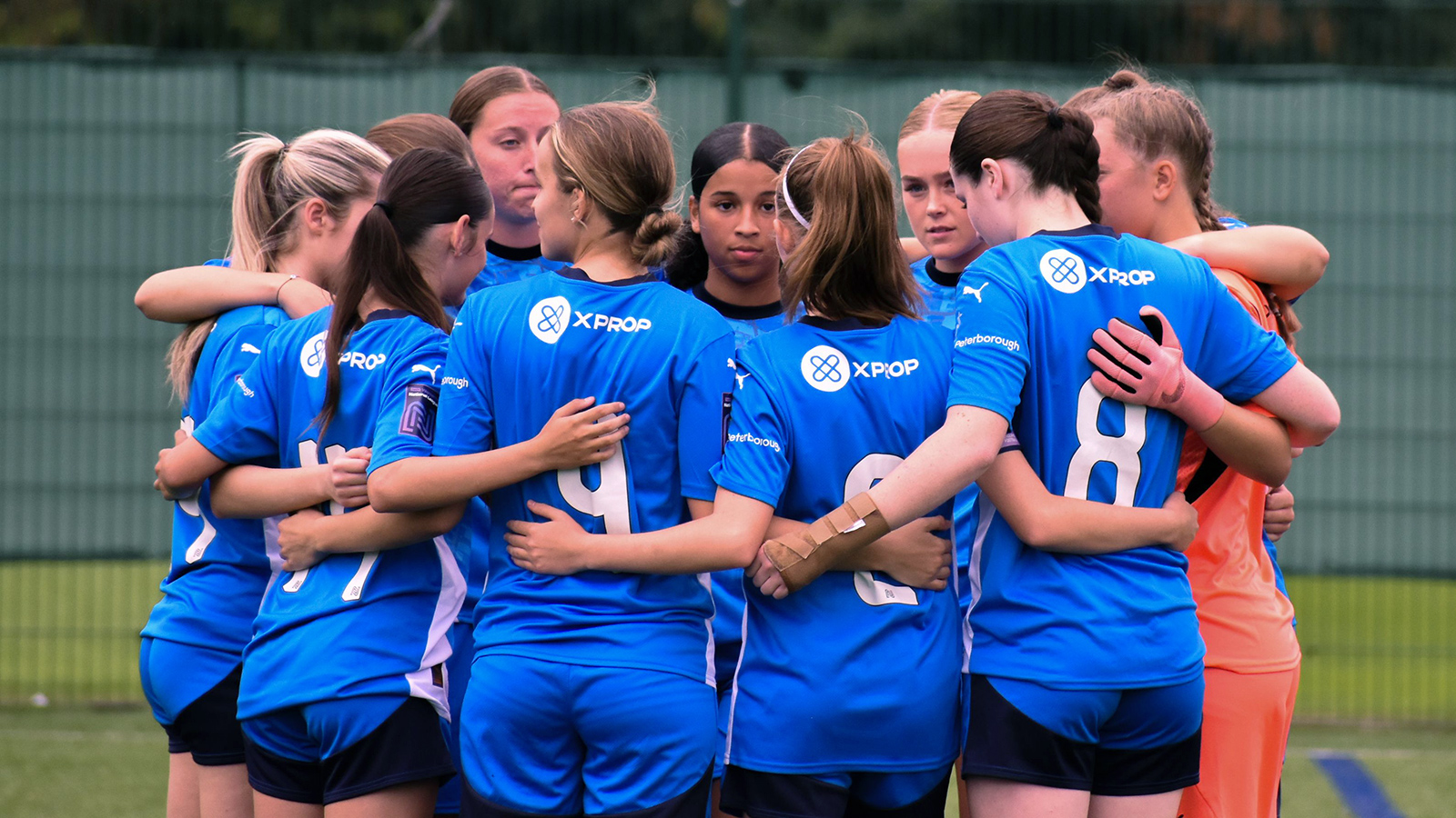 Posh Women U23s huddle together ahead of kick-off