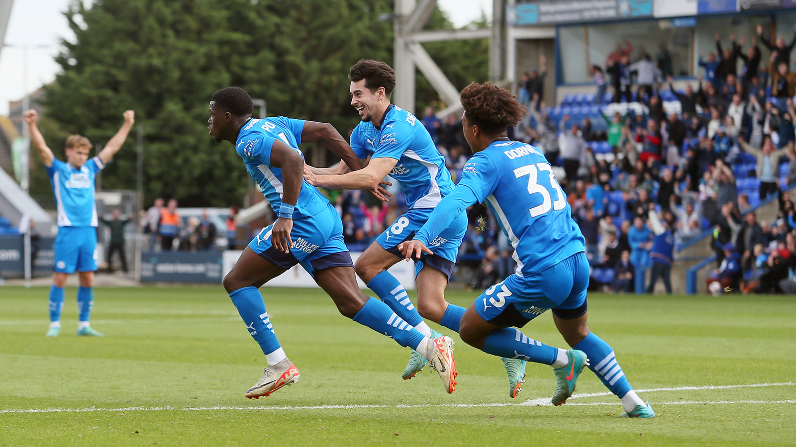 Kwame Poku celebrates scoring his winning goal against Stevenage