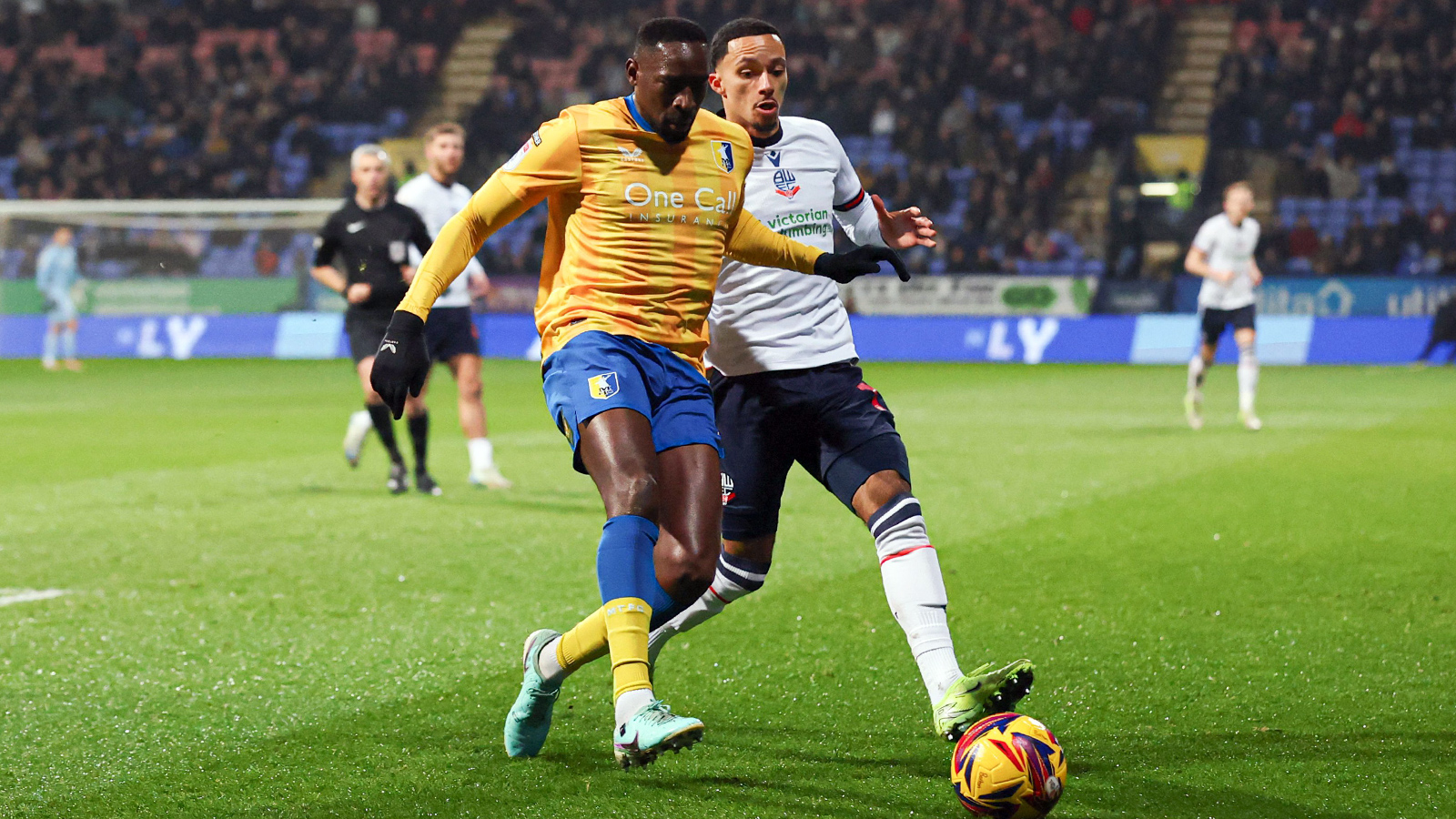 Lucas Akins in action for Mansfield Town