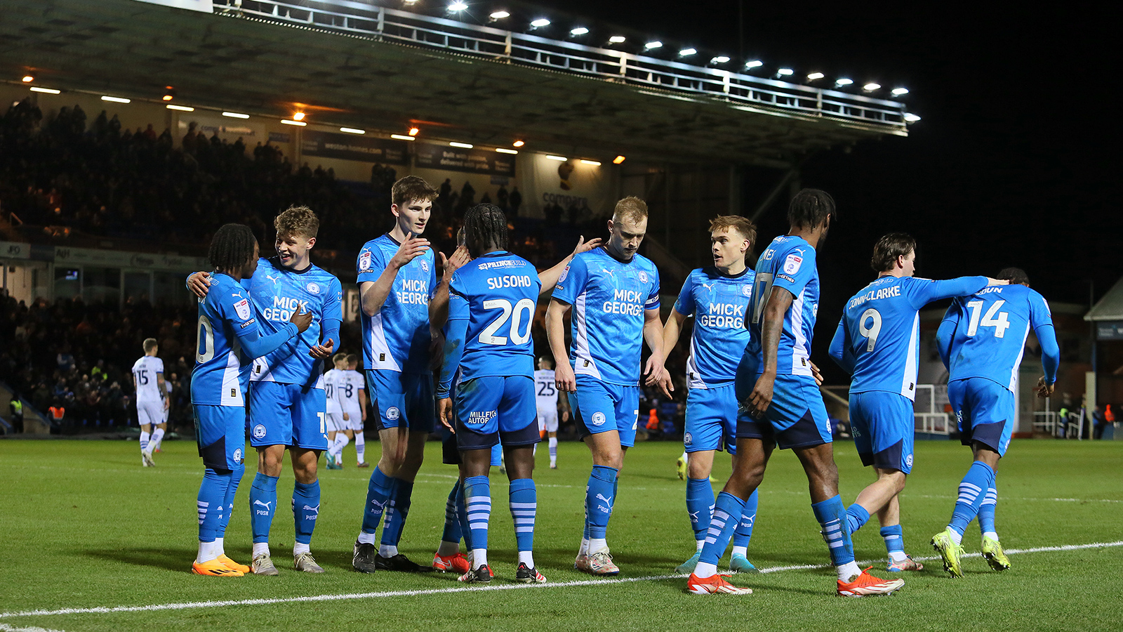 Posh celebrate the winning goal against Wigan Athletic