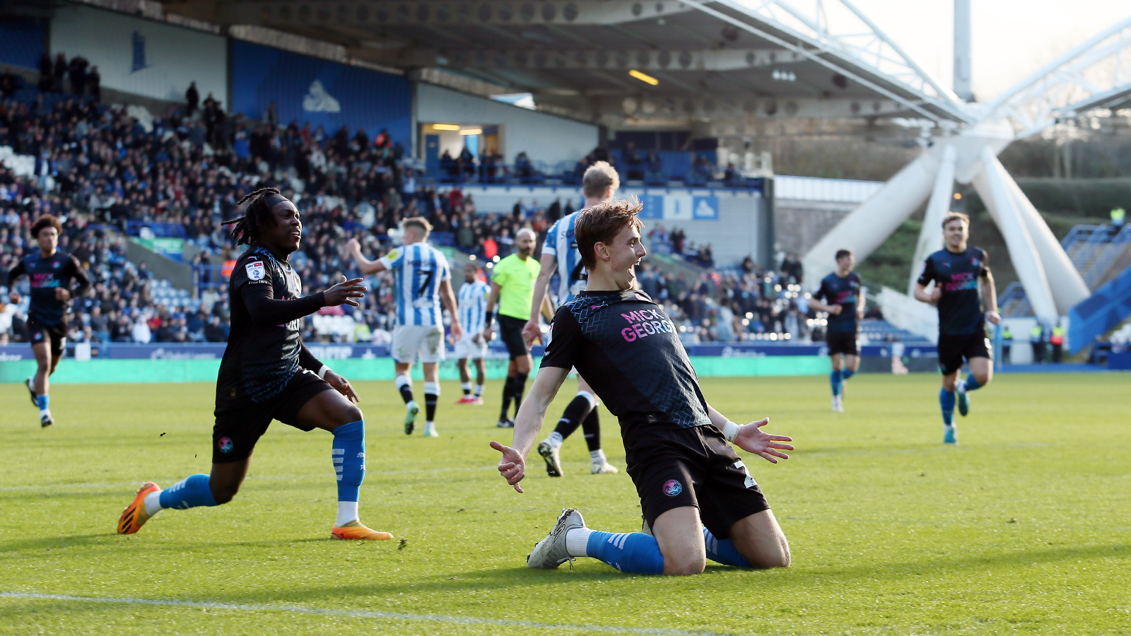 Hector Kyprianou celebrates scoring against Huddersfield Town