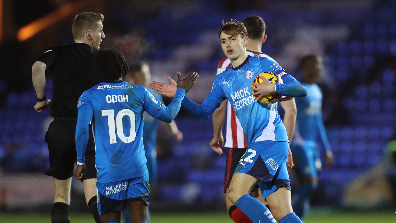 Hector Kyprianou and Abraham Odoh celebrate scoring against Cheltenham Town