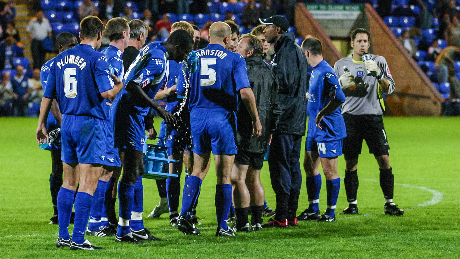 Keith Alexander talks to his players before the penalty shoot-out victory over Ipswich Town