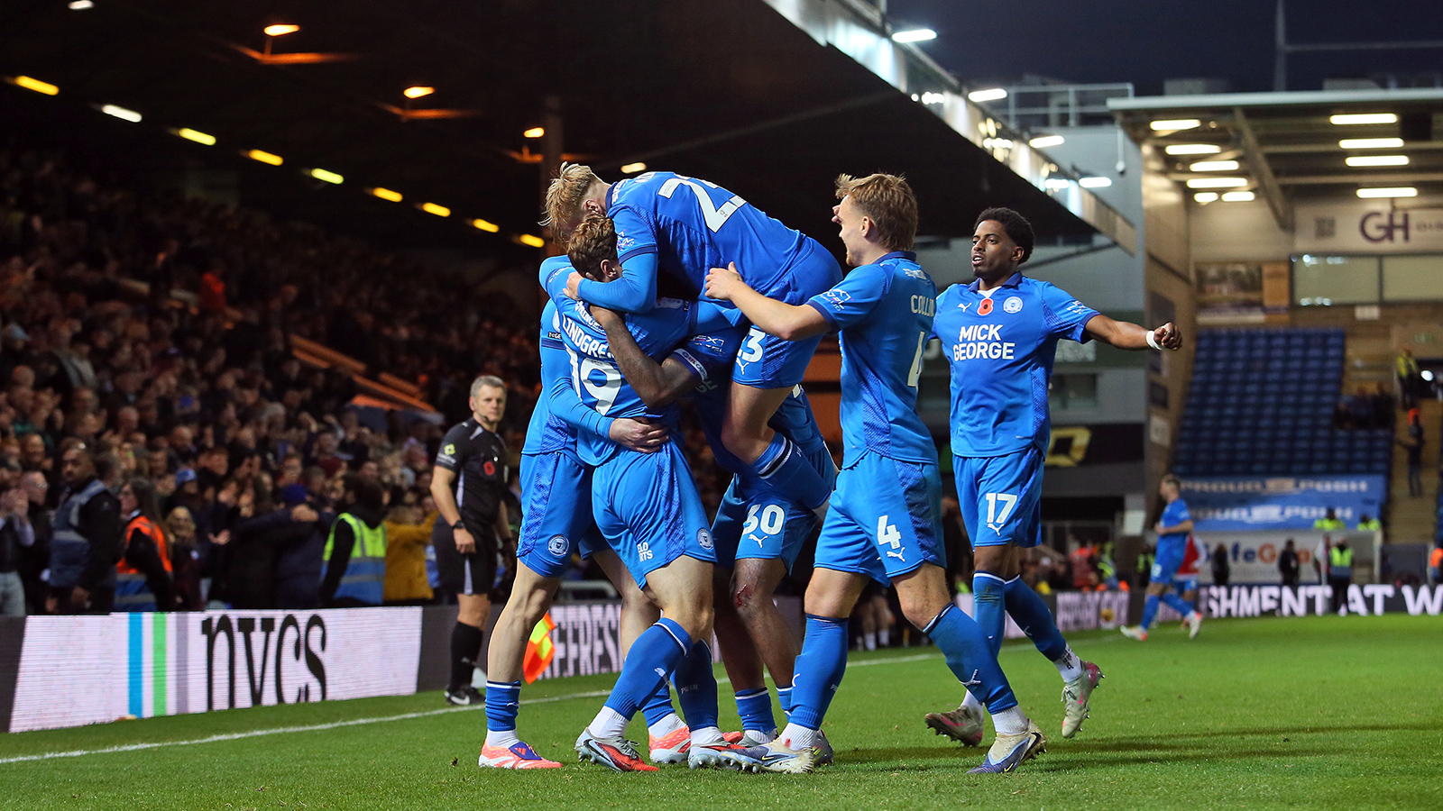 Posh players celebrate