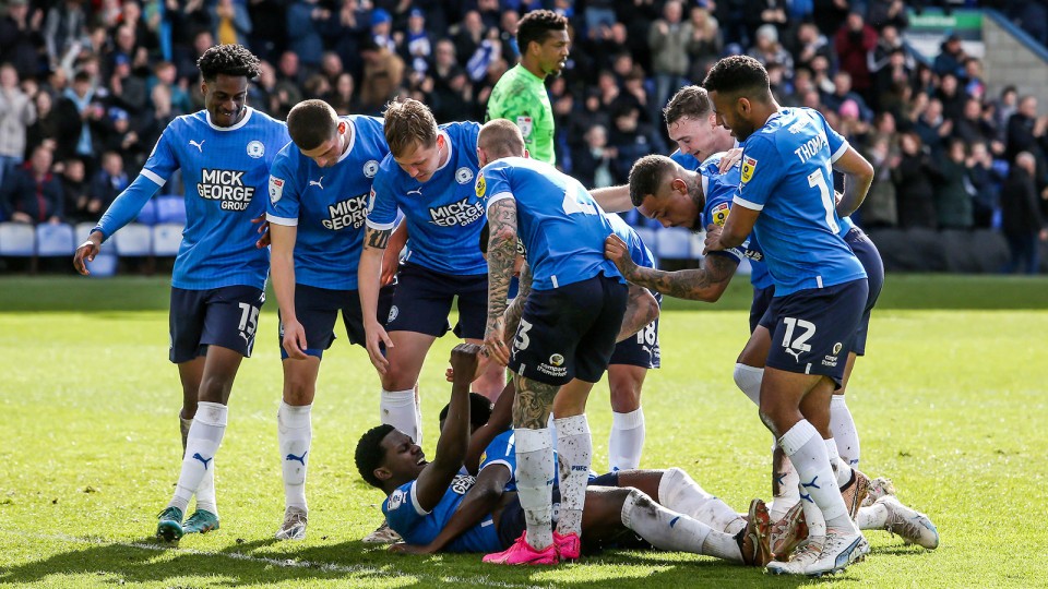 Ephron Mason-Clark is congratulated after scoring against Exeter City