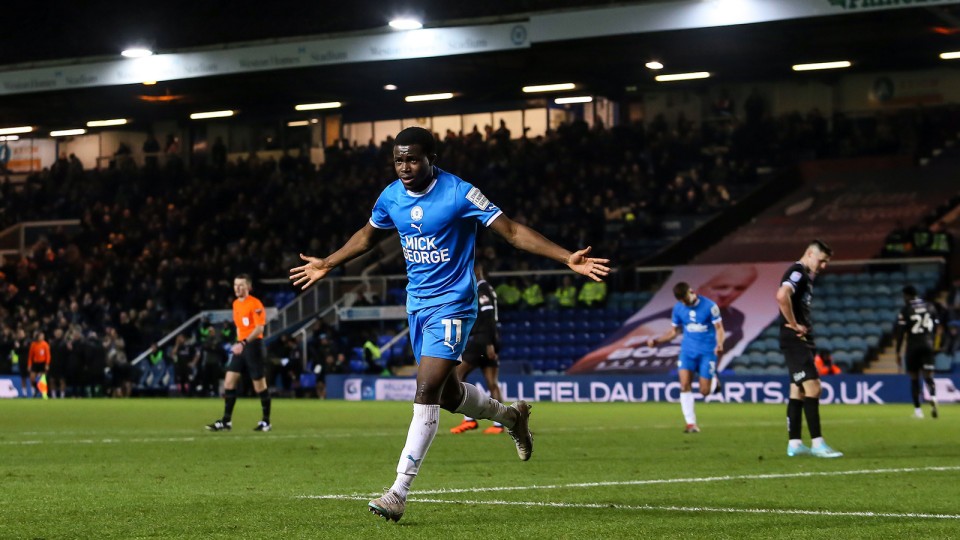Kwame Poku celebrates his goal against Burton Albion