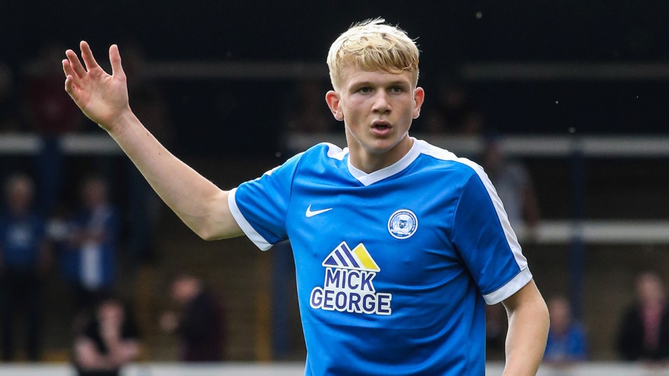 A young Lewis Freestone in action for Posh