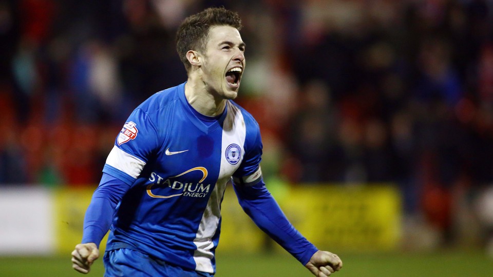Tommy Rowe celebrates scoring the winning penalty in the win over Swindon Town