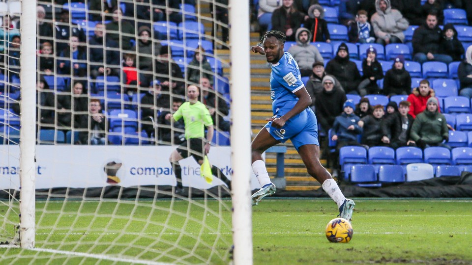 Ricky-Jade Jones scores his goal against Oxford United