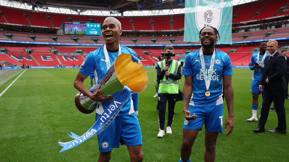 Malik Mothersille and Ricky-Jade Jones with the Vertu Trophy