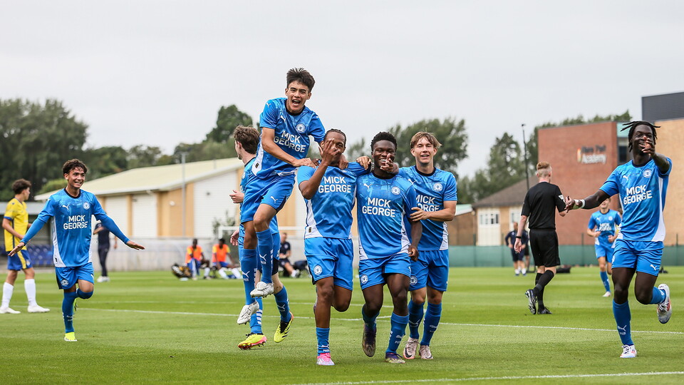The Posh Under 18s celebrate scoring against Colchester United