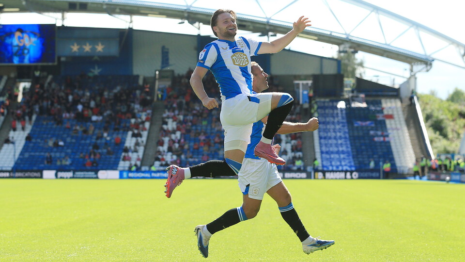 Alfie May celebrates scoring for Huddersfield Town