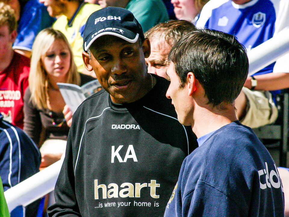 Keith Alexander shares a joke with the Bury Manager before kick-off