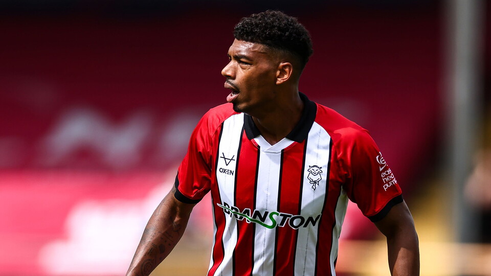 Reeco Hackett in action for Lincoln City