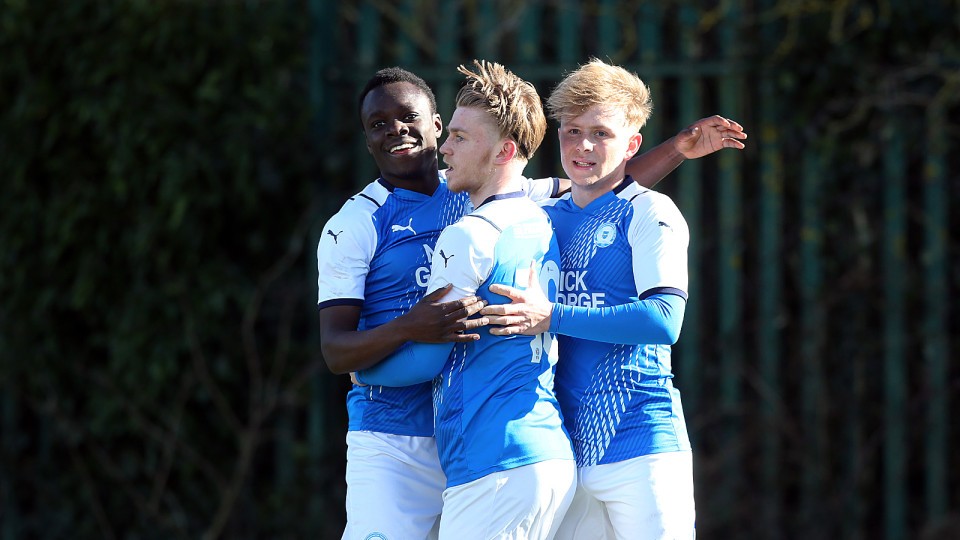 Joe Taylor celebrates scoring for the Posh U23s