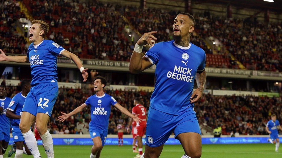 Jonson Clarke-Harris celebrates scoring against Barnsley