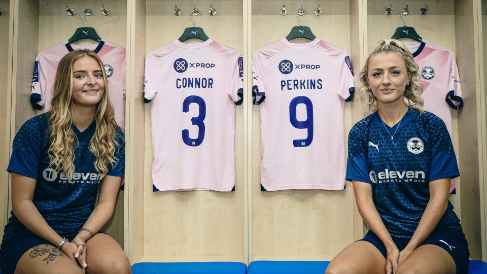 Keir Perkins and Niamh Connor Pose With Shirts