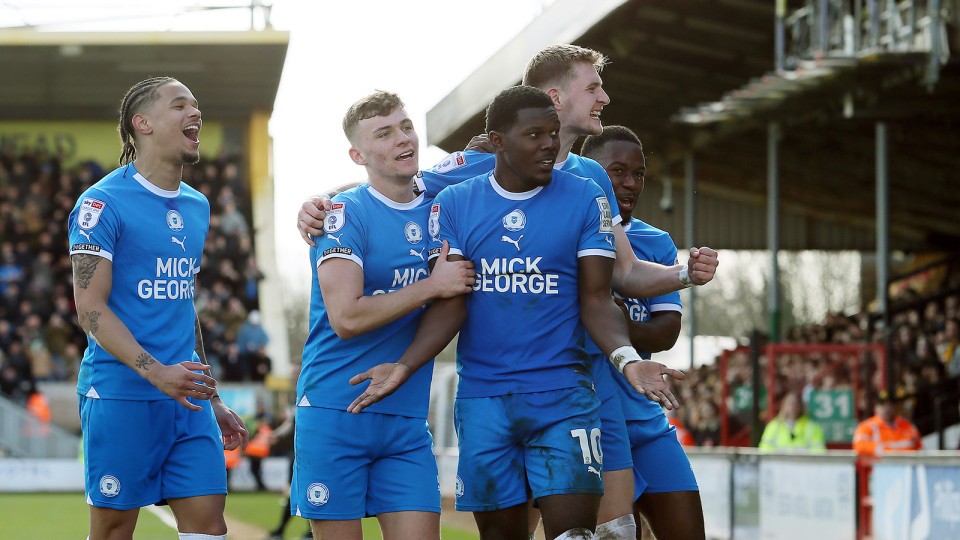 Ephron Mason-Clark celebrates scoring the winning goal over Cambridge United