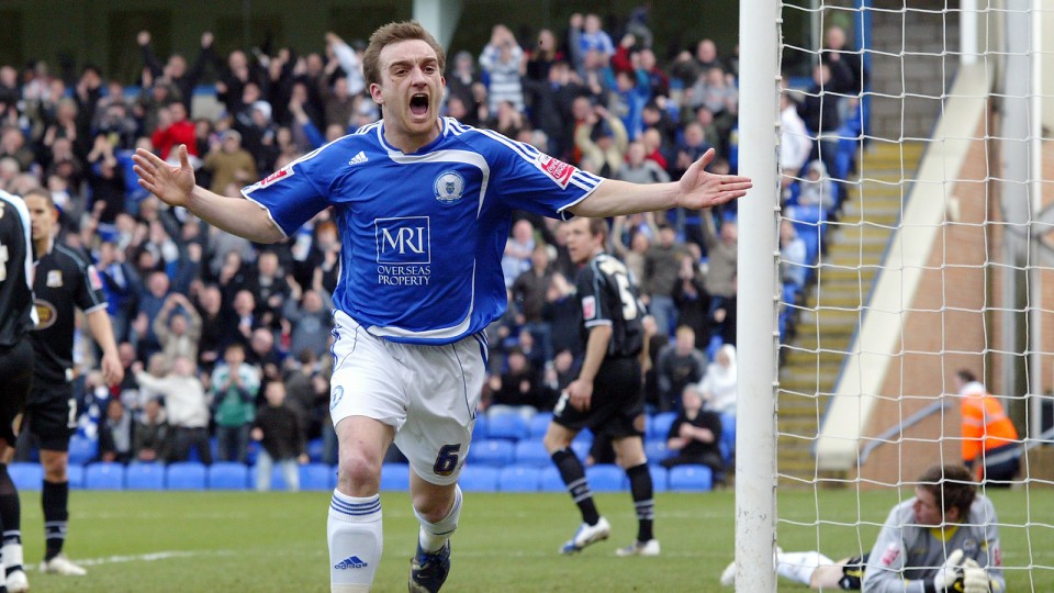 Charlie Lee celebrates scoring the winner against Northampton Town in 2009