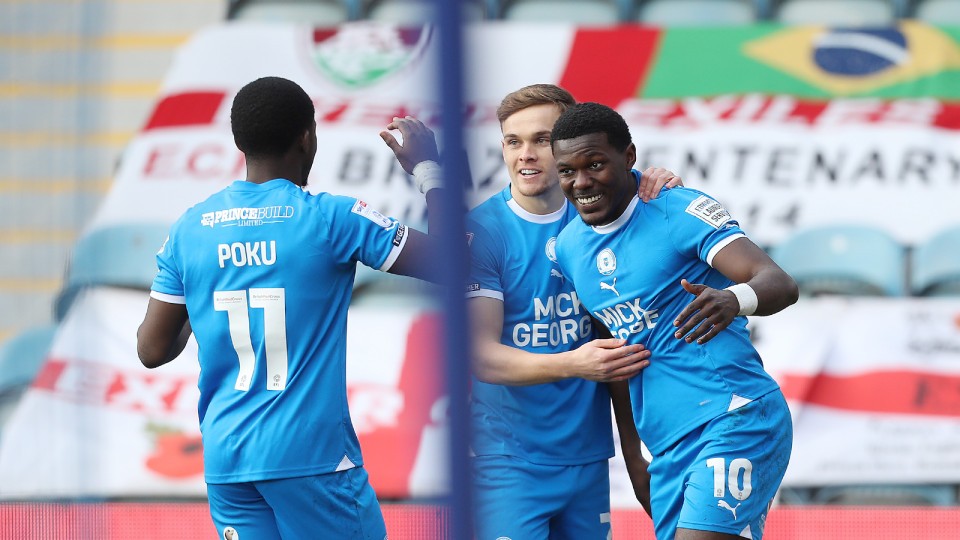 Ephron Mason-Clark celebrates scoring against Exeter City