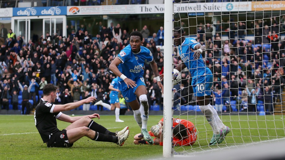 Malik Mothersille celebrates scoring against Bolton Wanderers