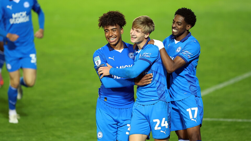 James Dornelly, JJ Morgan and Kyrell Lisbie celebrate