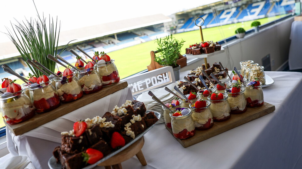 Food on a table at a football match