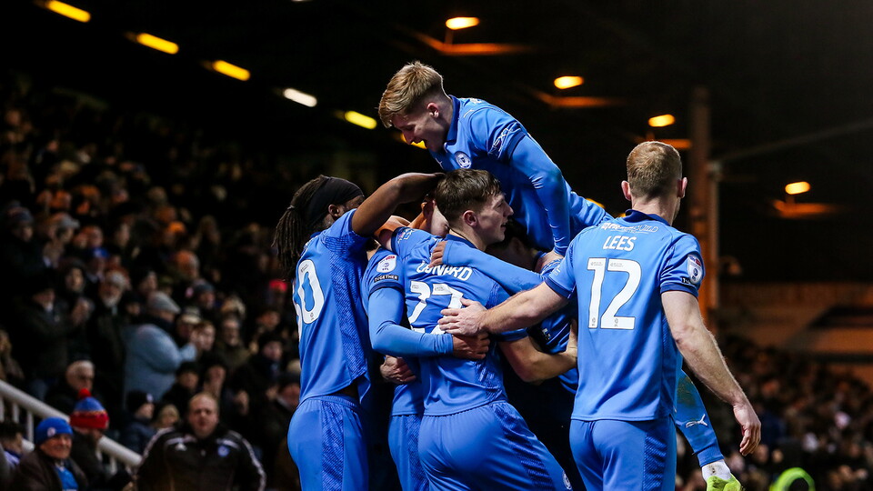 Posh players celebrate scoring
