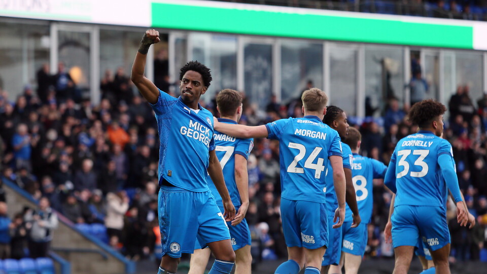 Kyrell Lisbie celebrates scoring against Wigan Athletic