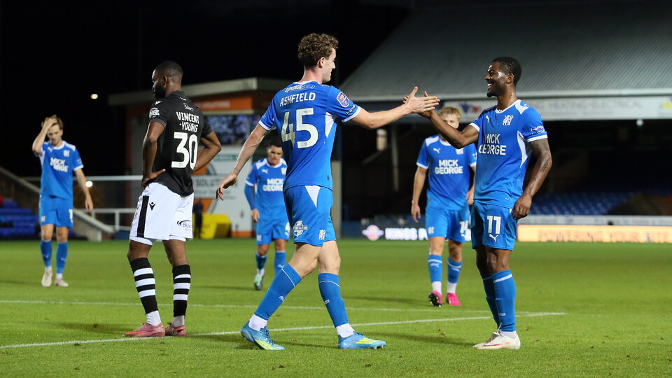 Harry Ashfield and Owura Edwards celebrate against Colchester United