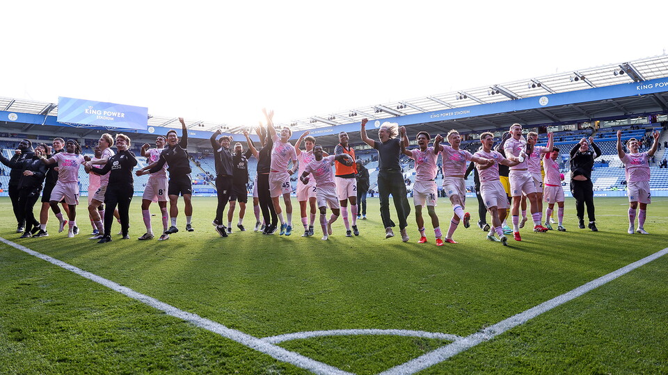 The Posh squad celebrate after beating Leicester City