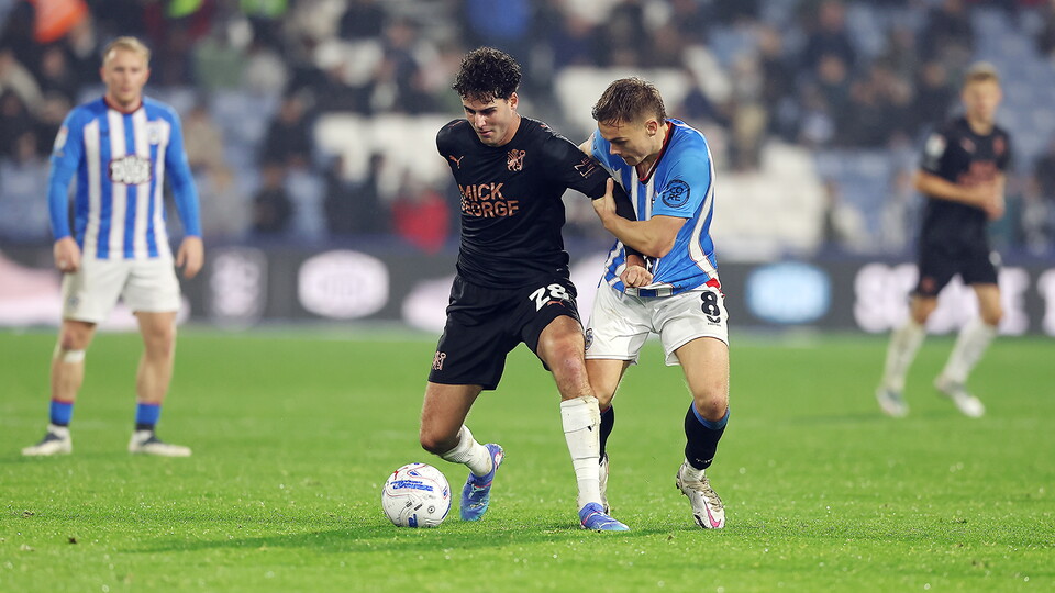 Action between Posh and Huddersfield Town