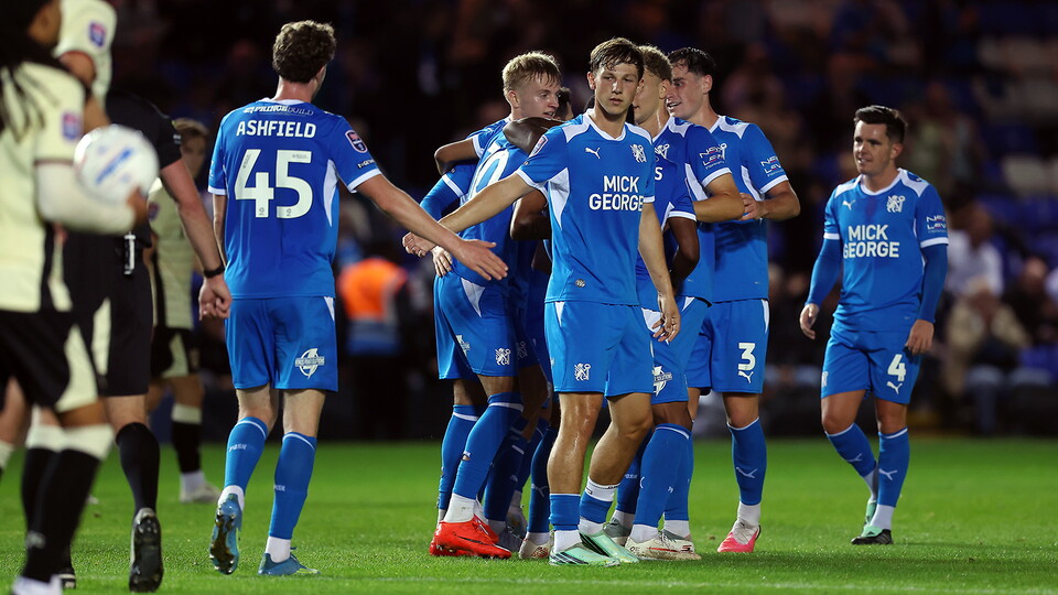 Posh players celebrate scoring