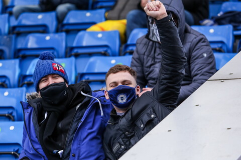 fans wearing masks