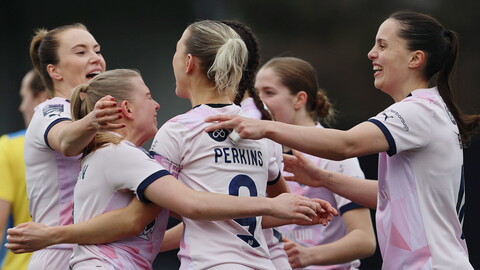 Posh Women celebrate scoring a goal