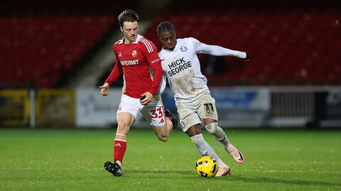 Action between Posh and Swindon Town