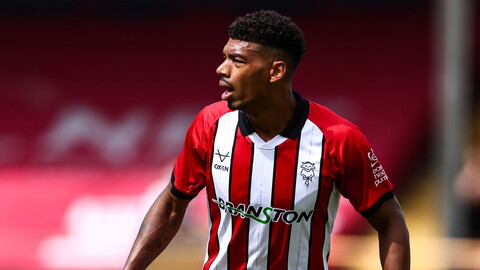 Reeco Hackett in action for Lincoln City