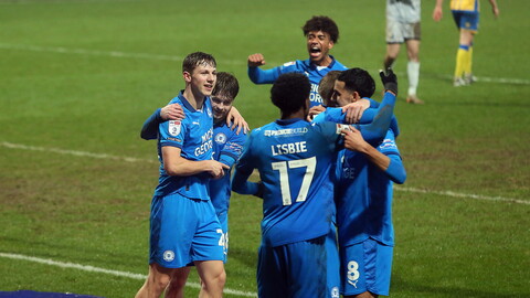 Harry Leonard celebrates scoring with his team-mates